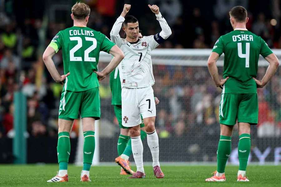 Cristiano Ronaldo leaves the field after receiving a red card