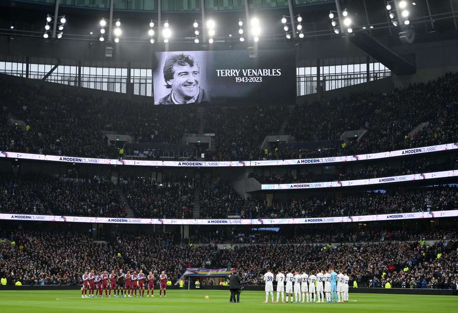 Tottenham and Aston Villa pause for a minutes applause following the recent passing of former English football player and manager Terry Venables