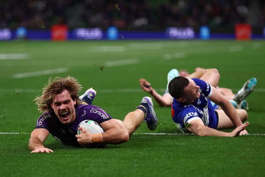 Melbourne Storm fullback Ryan Papenhuyzen dives across the line against the Canterbury Bulldogs on Friday night. 