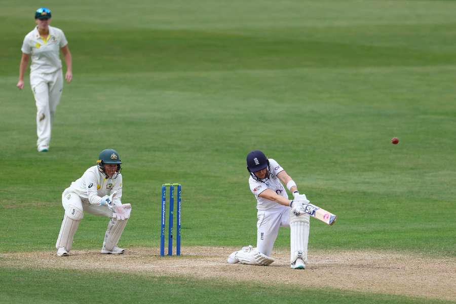 England's Heather Knight hits a six