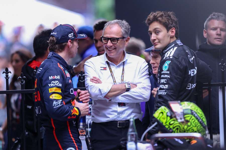 Stefano Domenicali speaks to Max Verstappen and George Russell earlier in the season