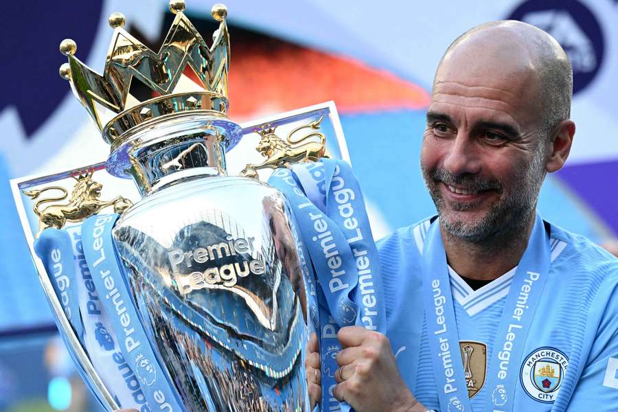 Pep Guardiola poses with the Premier League trophy after the 2023/24 season