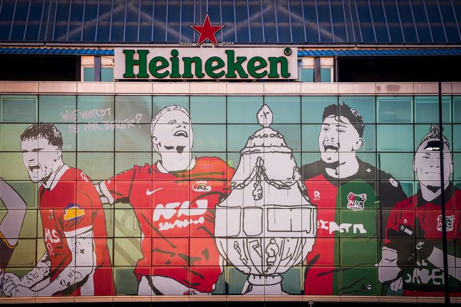 Troy Parrott, Kees Smit, Başar Önal, and Tjaronn Chery are depicted on the front of De Kuip