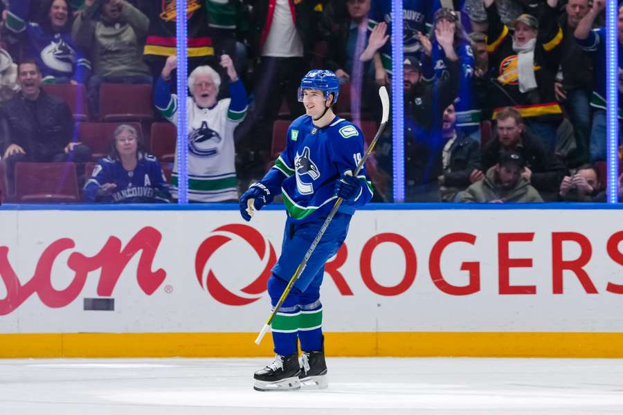 Vancouver Canucks forward Drew O'Connor smiling after a goal against the Colorado Avalanche (2025)