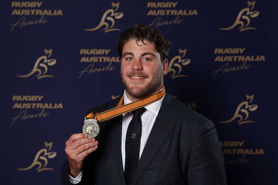 Fraser McReight posing with the John Eales Medal. Fraser McReight posing with the John Eales Medal.