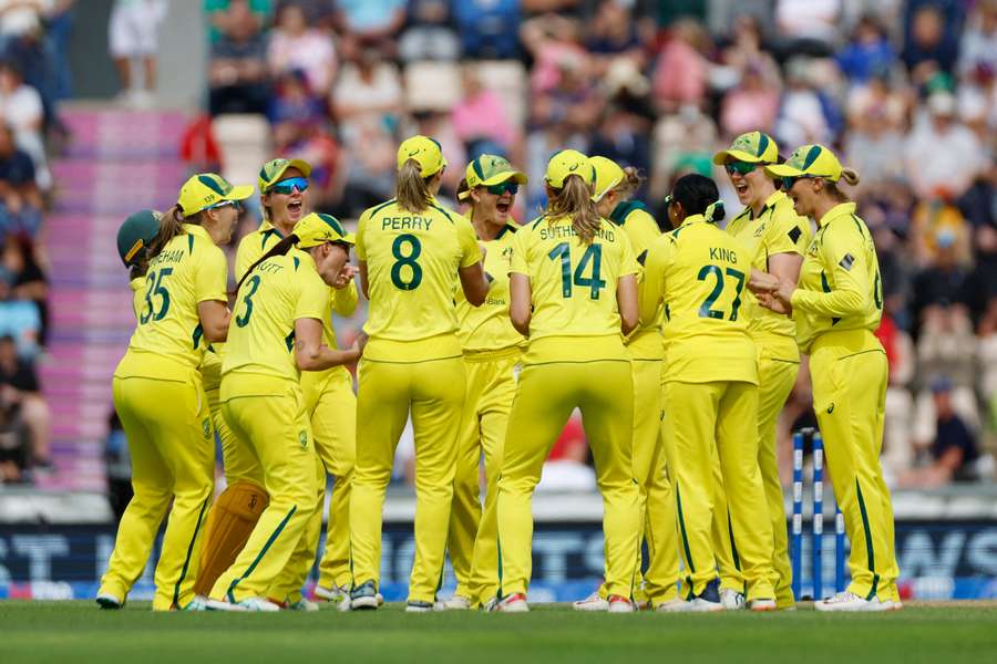 Australia celebrate a wicket during the game against England