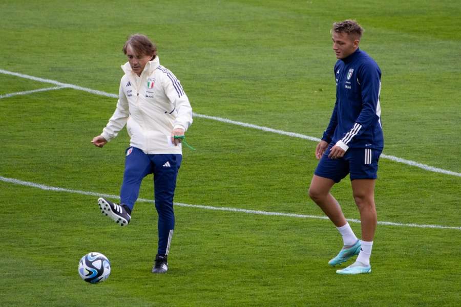 Mancini (L) takes Italy training ahead of the England match