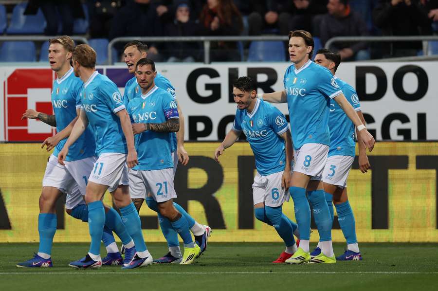 Napoli's Scott McTominay celebrates scoring their only goal of the game with teammates Napoli's Scott McTominay celebrates scoring their only goal of the game with teammates
