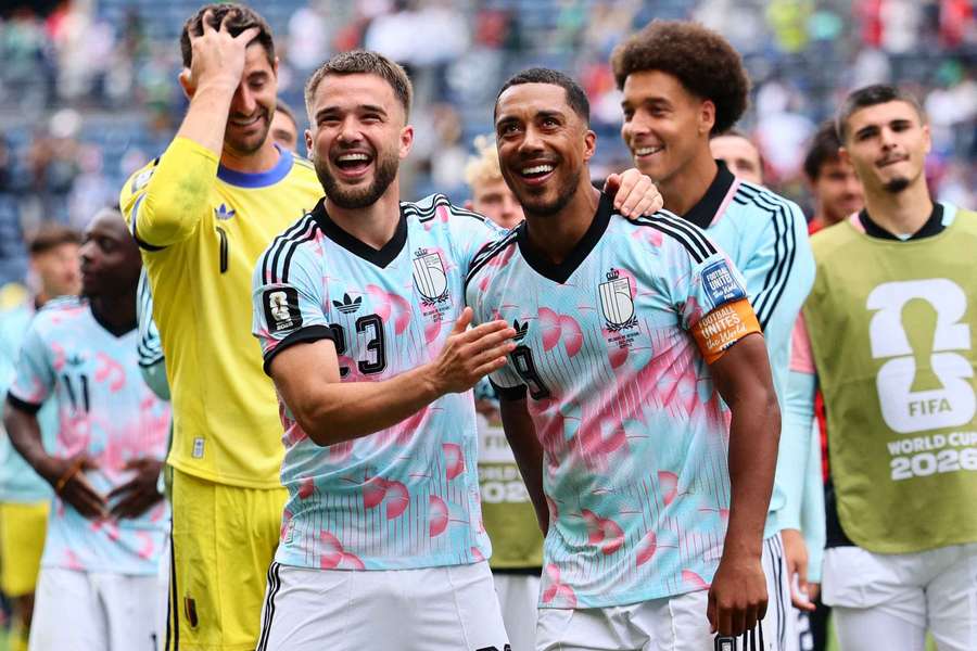 Axel Witsel, Youri Tielemans and teammates celebrate Belgium's incredible comeback win over Senegal.