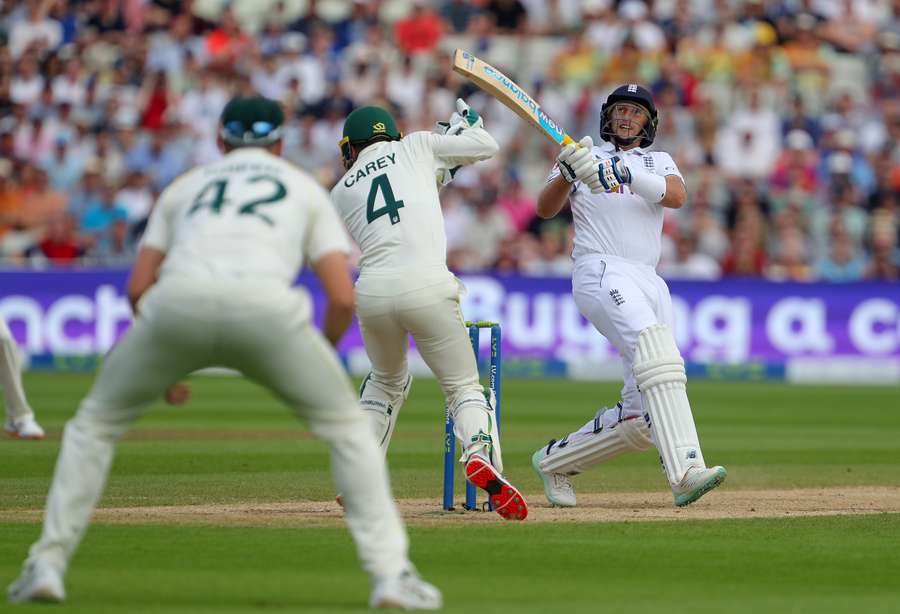 England's Joe Root watches the ball after playing a shot for six runs on day four