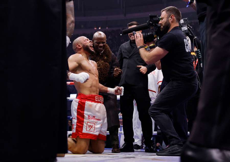 Chris Eubank JR celebrates with his father's former Boxer Chris Eubanian after he won the mid-weight against Conor Benna Chris Eubank JR celebrates with his father's former Boxer Chris Eubanian after he won the mid-weight against Conor Benna