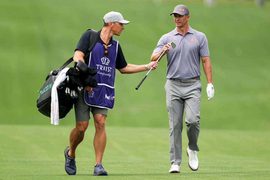 Adam Scott walks the ninth hole of the Quail Hollow Country Club at the weekend.