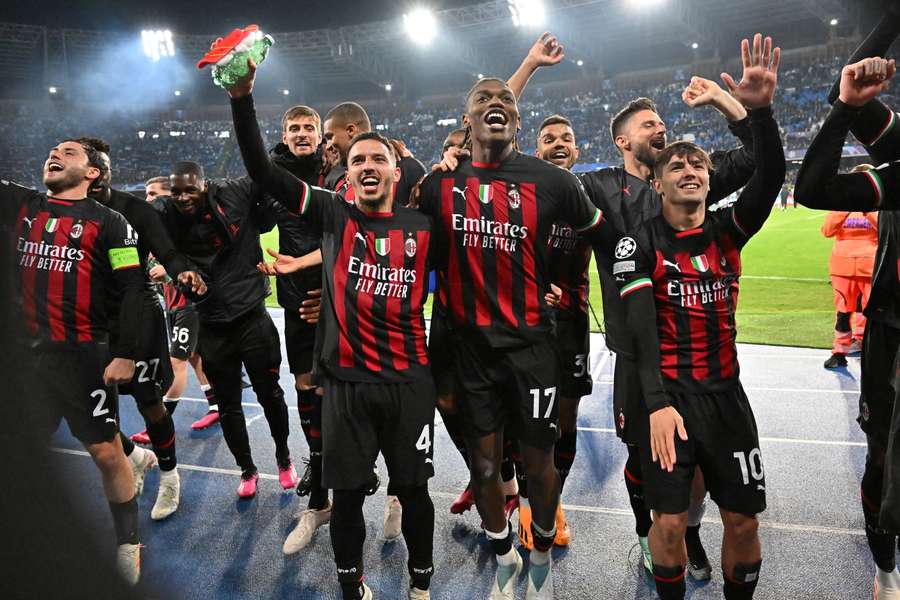 AC Milan celebrate their famous victory over their Serie A rivals at full-time