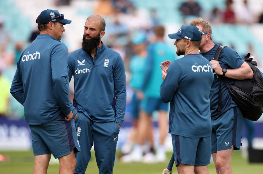 England's players take a walk around the pitch