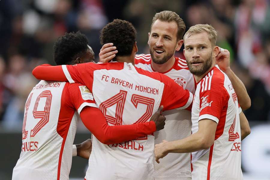 Bayern players celebrate their third goal