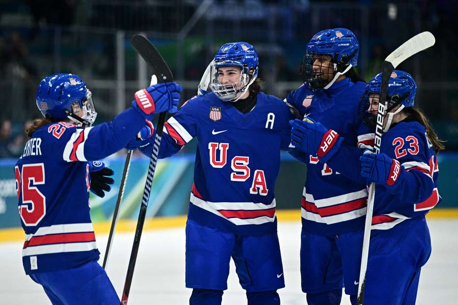 USA Women’s hockey team celebrates goal against Italy USA Women’s hockey team celebrates goal against Italy