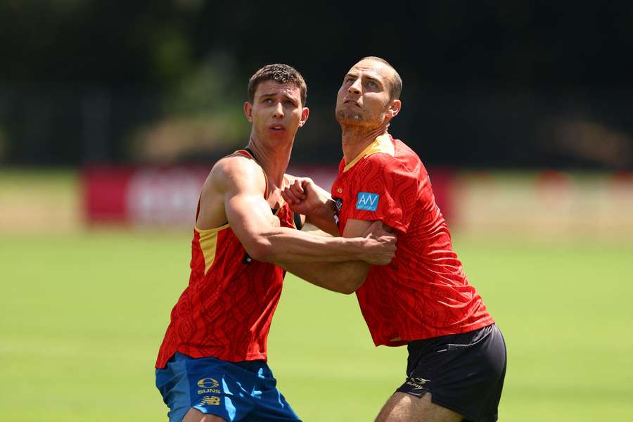 Max Knobel (left) at a Gold Coast training session. Max Knobel (left) at a Gold Coast training session.
