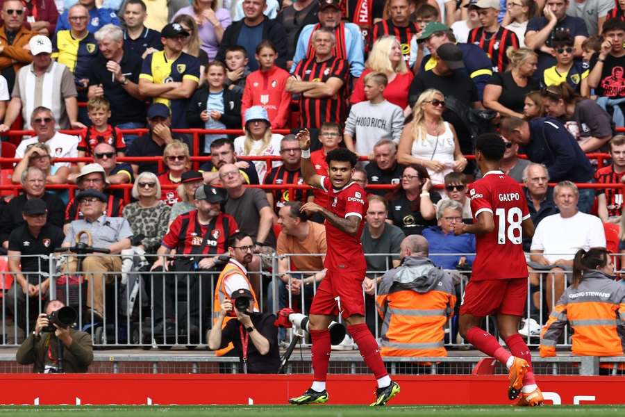 Luis Diaz (L) celebrates his goal