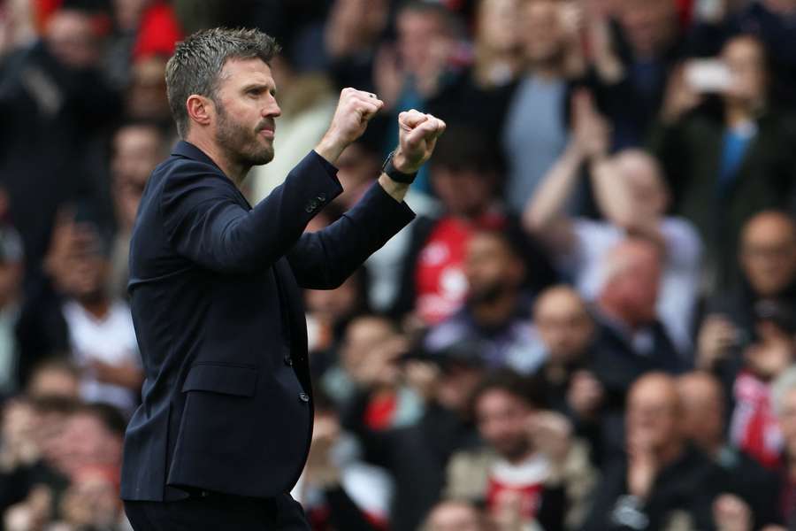 Michael Carrick celebrates after Manchester United's victory over Liverpool at Old Trafford