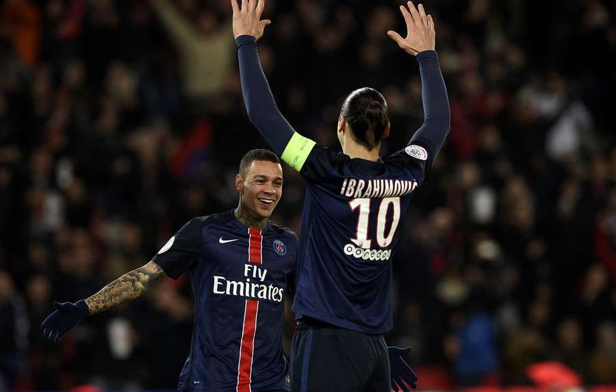 Van der Wiel celebrates a PSG goal alongside Zlatan Ibrahimovic. Van der Wiel celebrates a PSG goal alongside Zlatan Ibrahimovic.