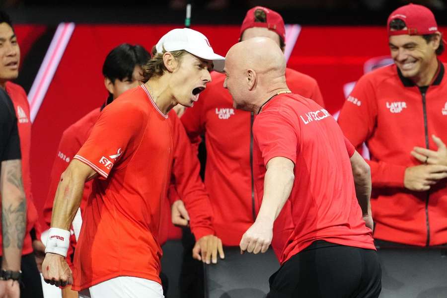 Alex De Minaur and Andre Agassi celebrate after the Aussie's win over Alexander Zverev Alex De Minaur and Andre Agassi celebrate after the Aussie's win over Alexander Zverev