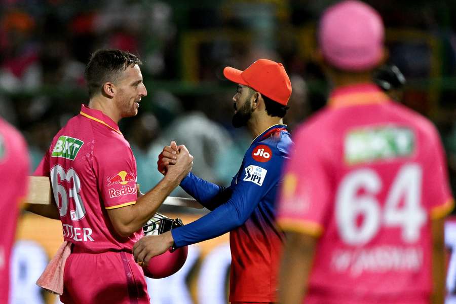Jos Buttler is congratulated by Virat Kohli after steering Rajasthan Royals to victory