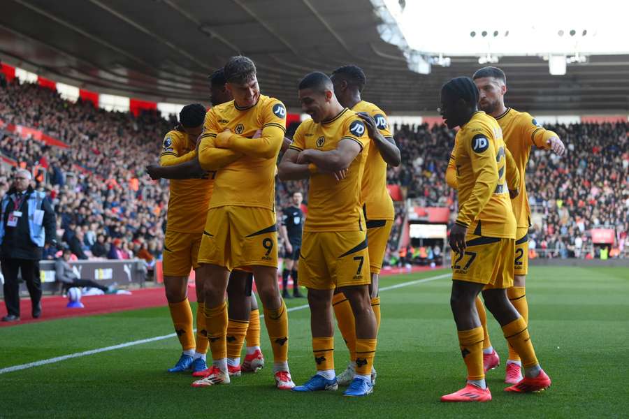 Jorgen Strand Larsen of Wolverhampton Wanderers celebrates with his teammates after scoring his team's first goal 