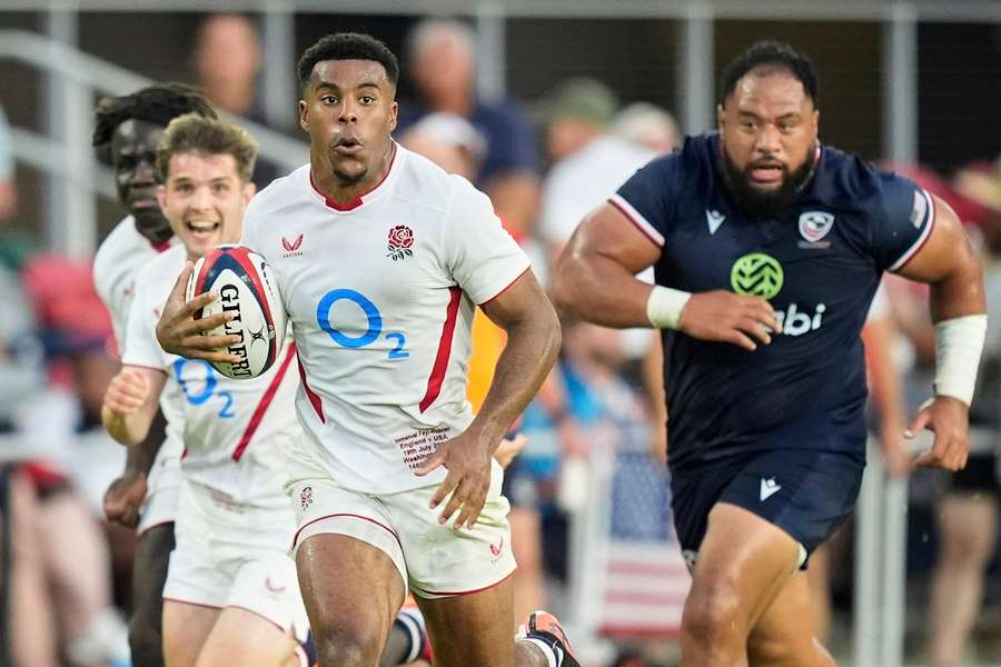 England's Immanuel Feyi-Waboso makes a break during the international against the USA