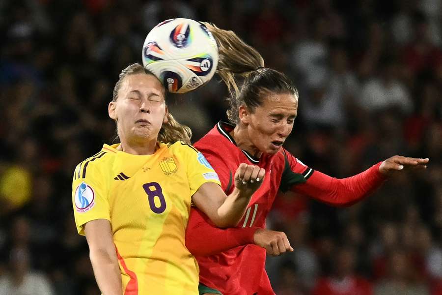 Belgium's Jarne Teulings and Portugal's Tatiana Pinto fight for the ball 