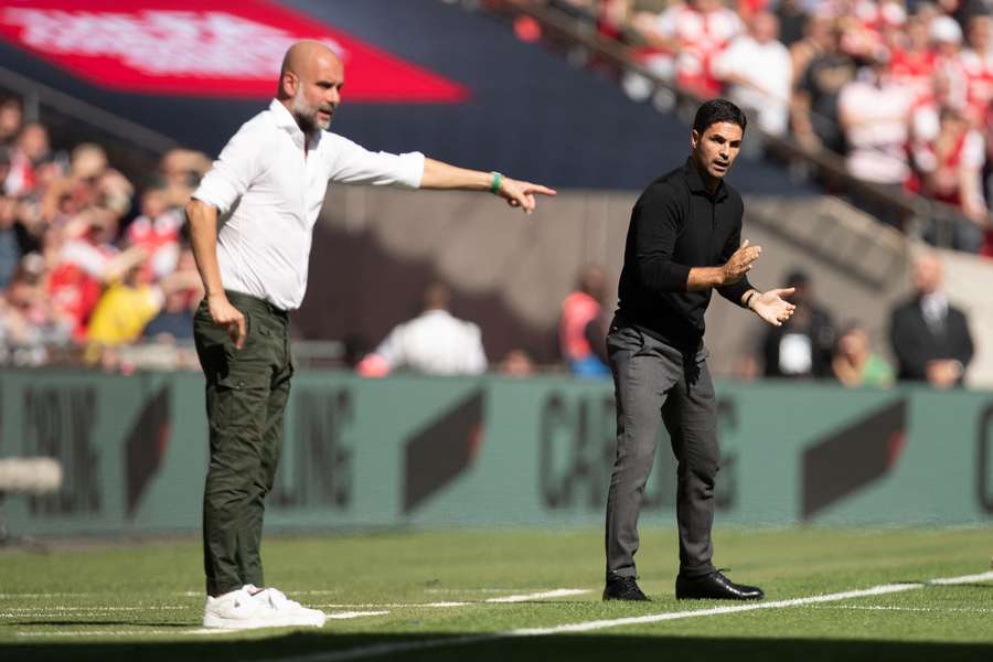 Pep Guardiola și Mikel Arteta 
