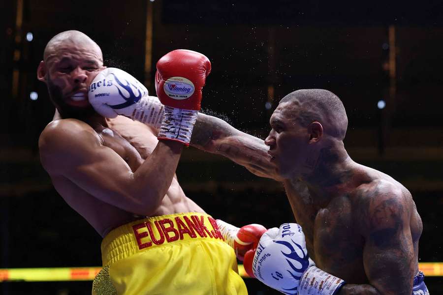 Conor Benn punches Chris Eubank Jr during their middleweight fight Conor Benn punches Chris Eubank Jr during their middleweight fight