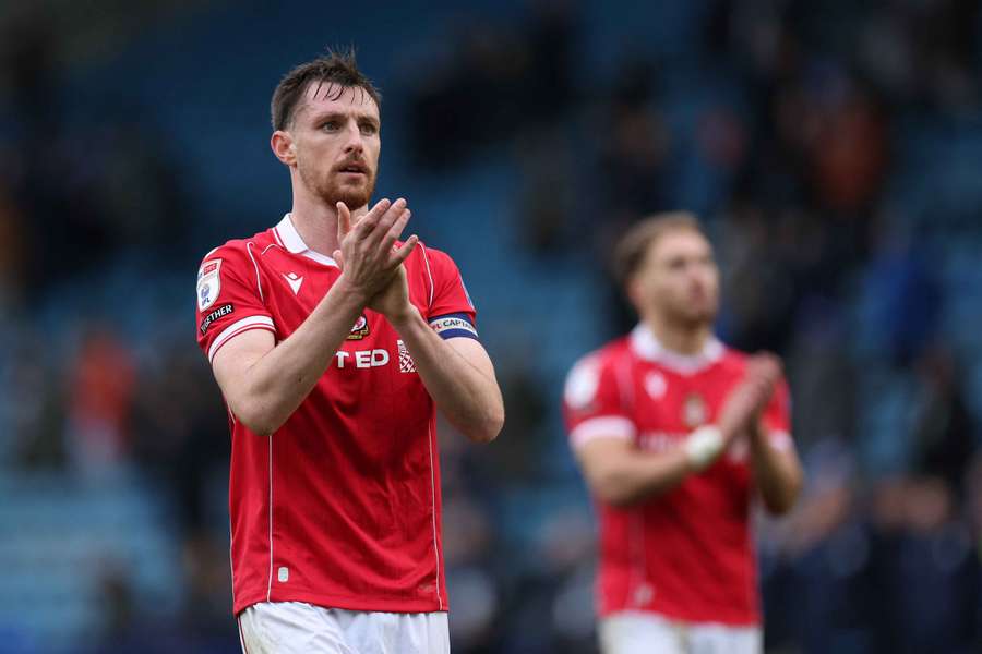 Wrexham's Dominic Hyam (left)