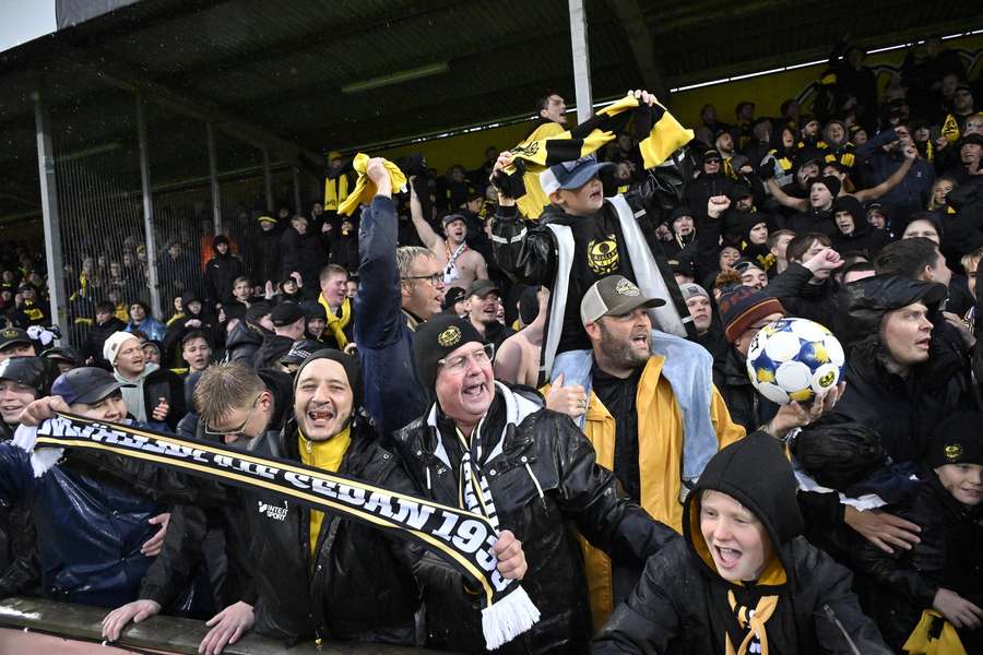 Jubilant Mjallby fans at full-time