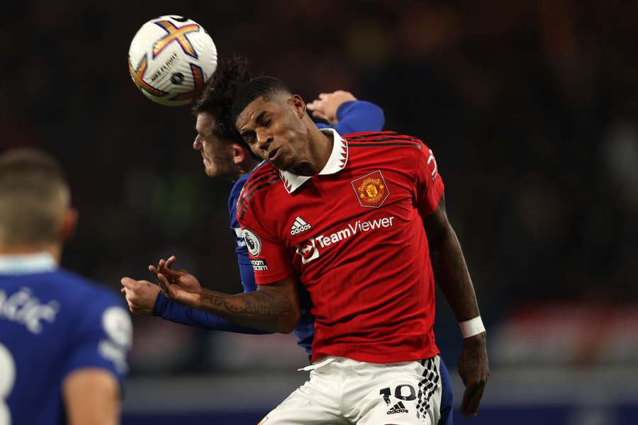 Marcus Rashford challenges for the ball