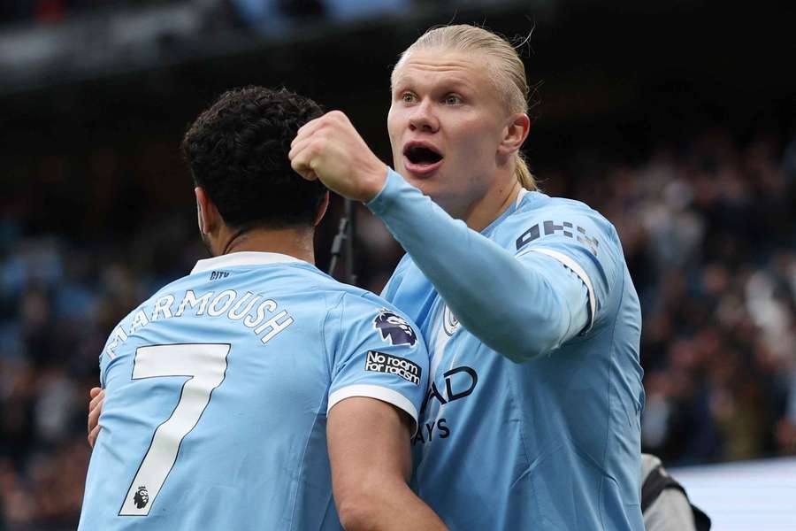 Manchester City's Erling Haaland celebrates scoring their second goal with Omar Marmoush