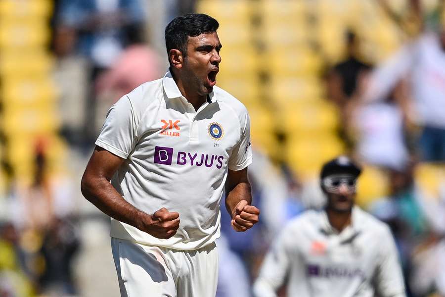 India's Ravichandran Ashwin celebrates after the dismissal of Australia's David Warner (not pictured)