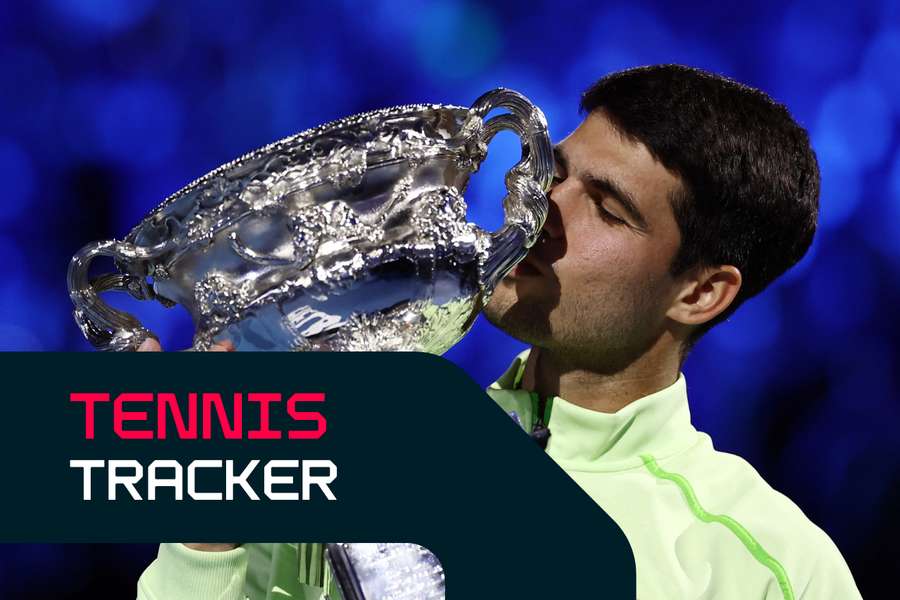 Alcaraz celebrates with the trophy