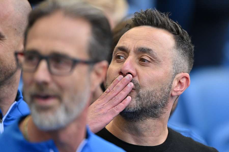 Brighton's Italian head coach Roberto De Zerbi looks on