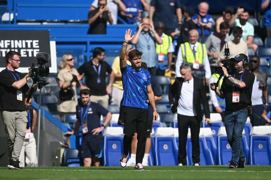 Chelsea's new signing Pedro Neto waves to the fans at half-time, in the pre-season friendly football match between Chelsea and Inter