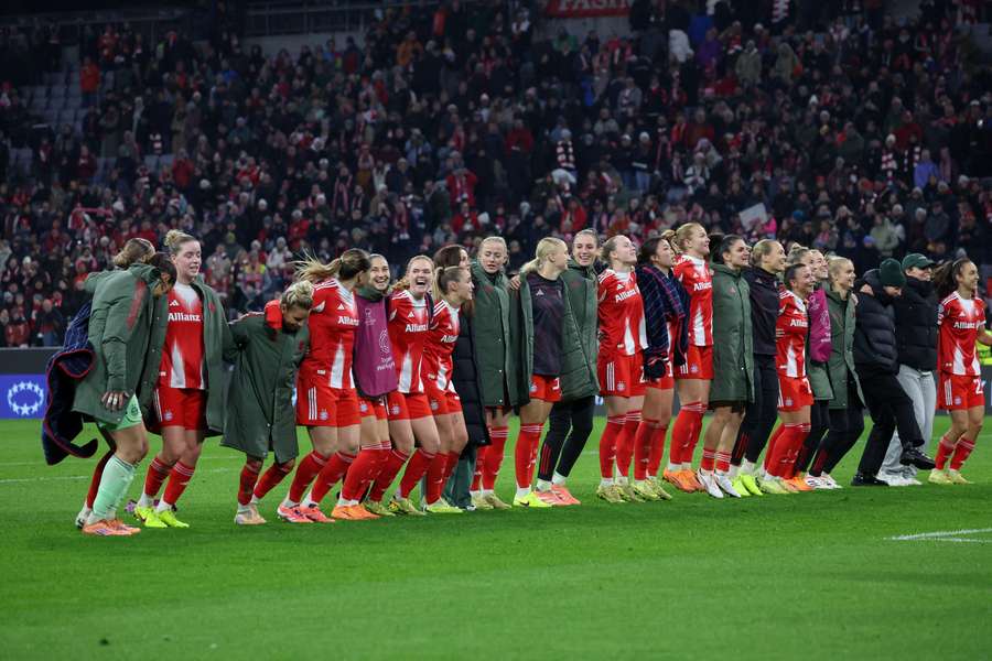 Bayern Munich celebrate their come-from-behind win over Arsenal in the UEFA Women's Champions League.