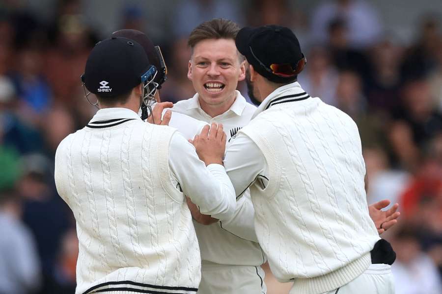 New Zealand's Michael Bracewell celebrates with teammates