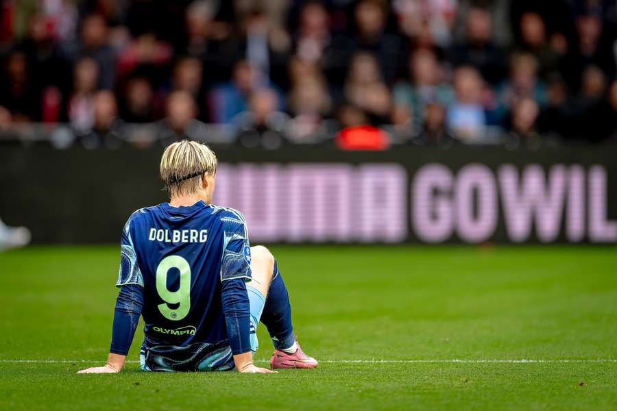 Ajax's Kasper Dolberg goes down injured in the game against PSV