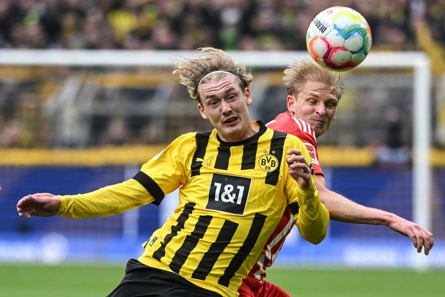 Brandt (L) in action for Dortmund