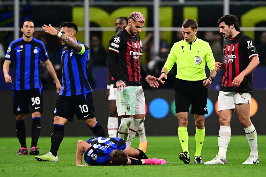 Inter Milan midfielder Nicolo Barella goes down injured