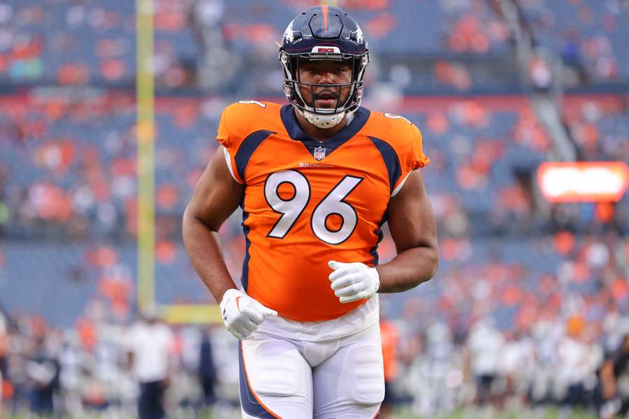 Eyioma Uwazurike #96 of the Denver Broncos warms up before the game against the Dallas Cowboys at Empower Field At Mile High