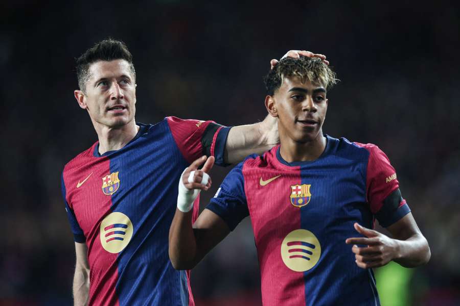Lamine Yamal celebrating his goal with Robert Lewandowski