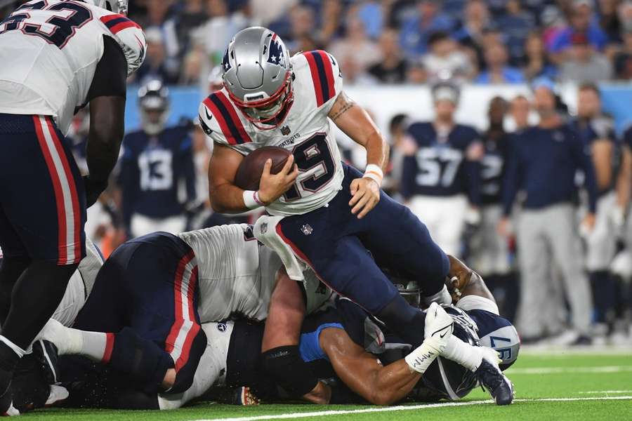 New England Patriots quarterback Trace McSorley (19) is sacked during the first half against the Tennessee Titans at Nissan Stadium