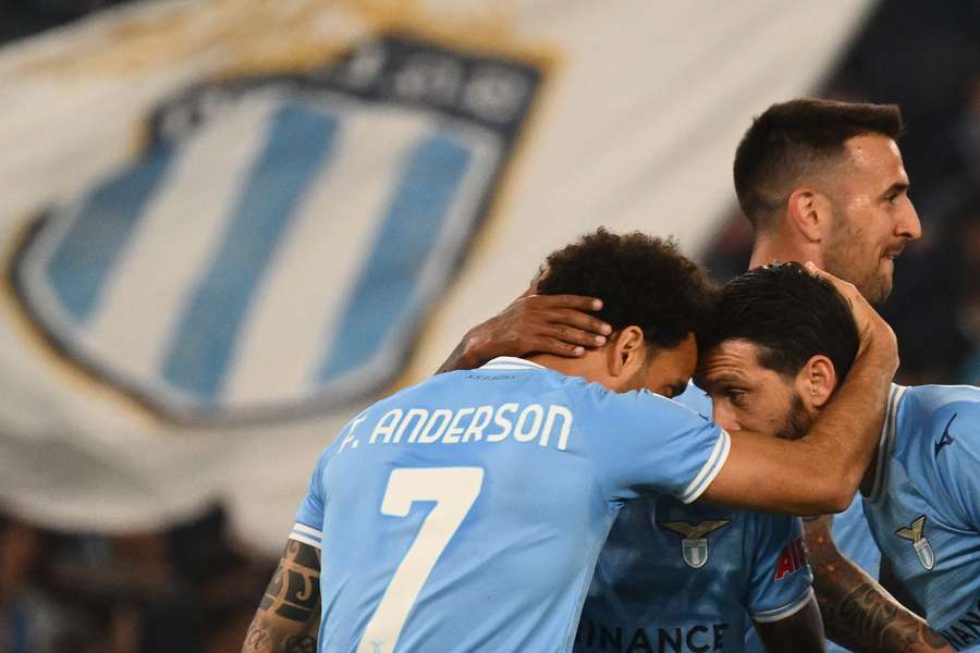Felipe Anderson celebrates with Luis Alberto after giving Lazio a 1-0 lead