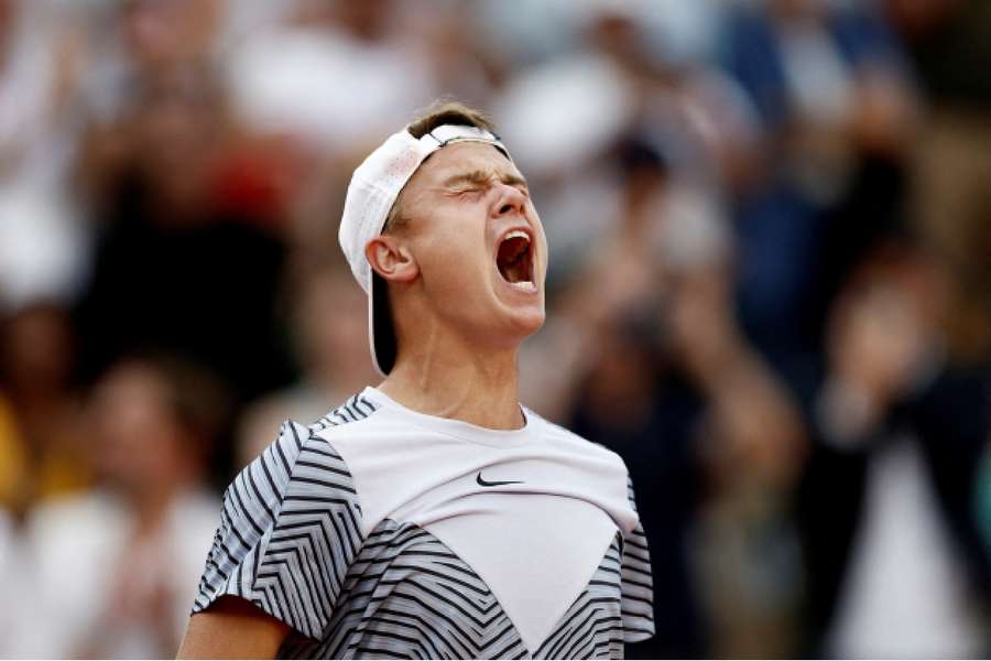 Holger Rune celebrates after winning his fourth-round match against Francisco Cerundolo