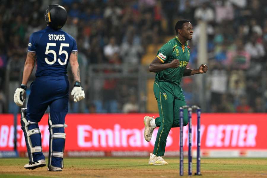 South Africa's Kagiso Rabada celebrates after taking the wicket of England's Ben Stokes 
